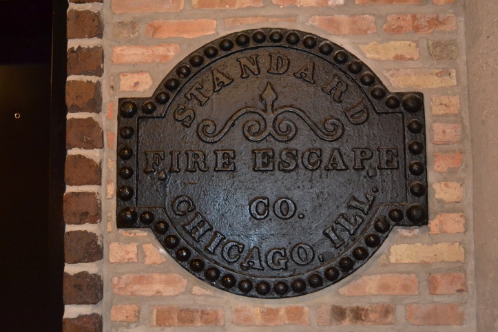 Old iron sign on the wall of the loft building