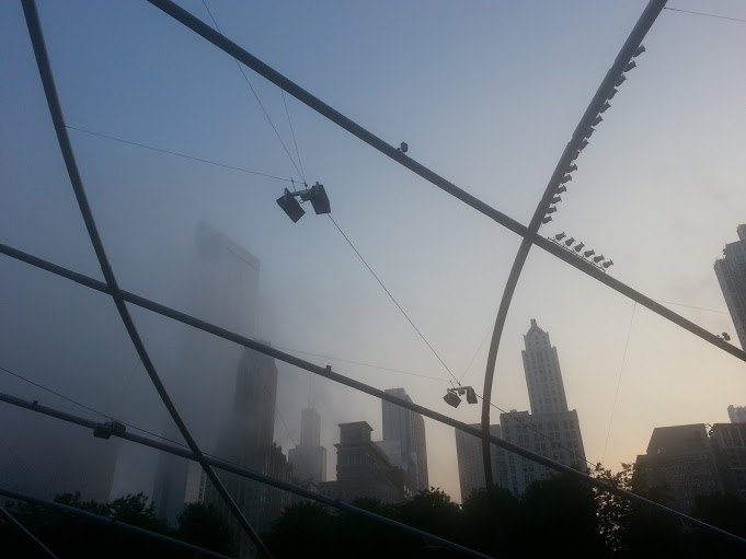 The fog slowly starts to cover Pritzker Pavilion