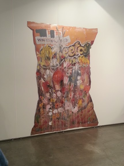 A huge bag of Cheetos? Of course, one of my faves. Although defacing it with graffiti is slightly blasphemous.