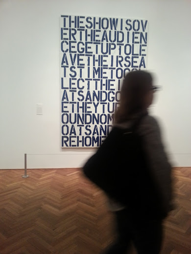 My mom walking past one of Wool's pieces