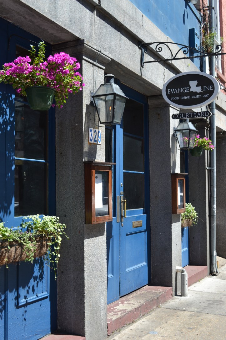 The French Quarter is all colorful doors and colorful flowers.