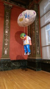 hebru brantley parade day rain art exhibit chicago cultural center flyboy hanging sculpture