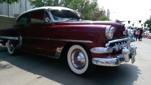 slow & low chicago lowrider community festival pilsen chicago urban art society cuas red vintage car 50s