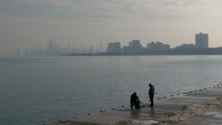 chicago downtown lake michigan skyline fishermen fog
